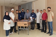 هفته تربیت‌بدنی؛ همراه با رقابت صمیمی فوتبال‌دستی در بیمارستان امیرالمومنین (ع)